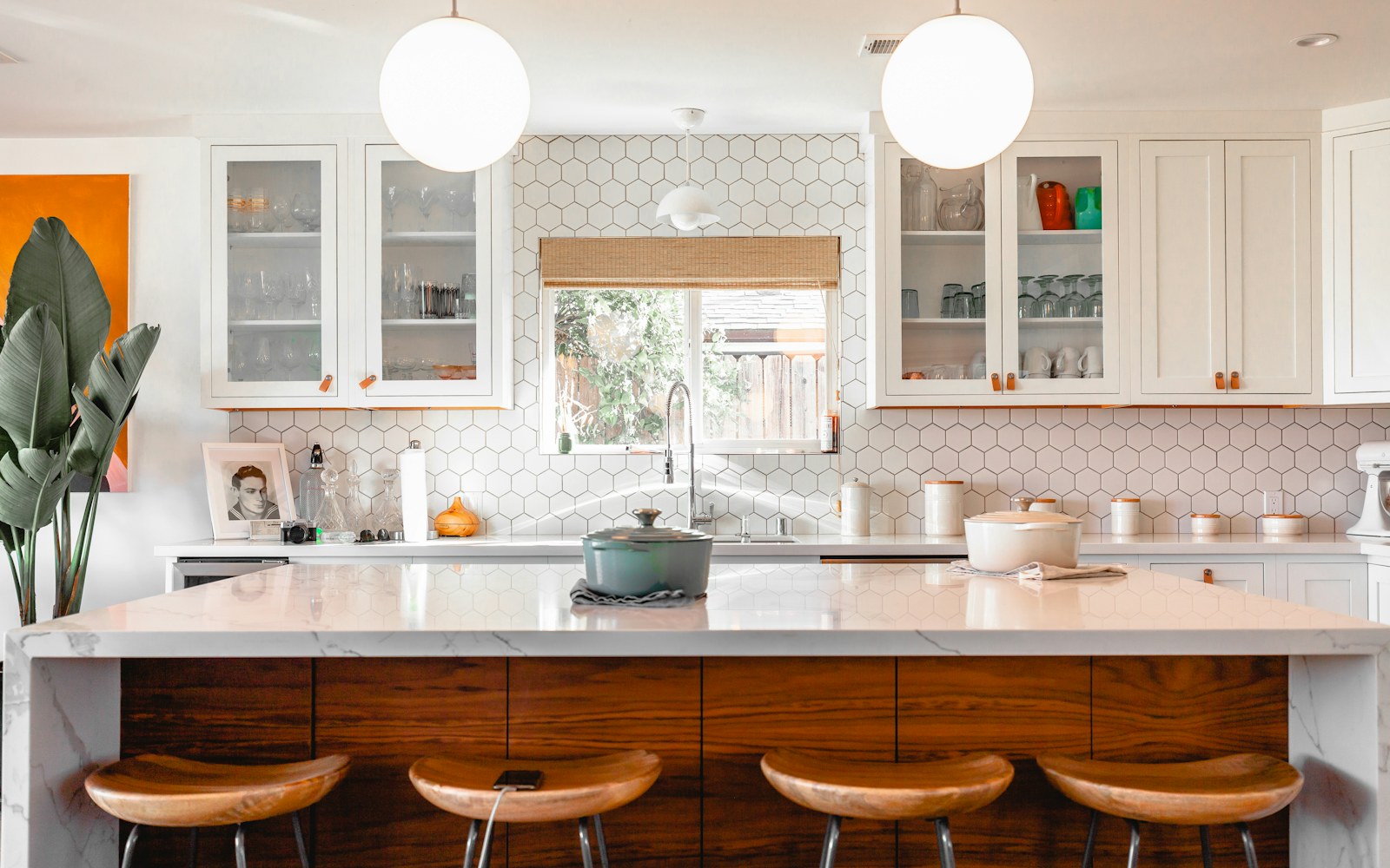 Compact countertop appliances arranged in a lived-in kitchen