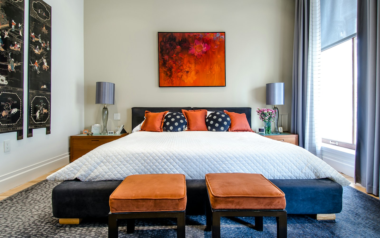A fresh bed being prepared with clean protective bedding